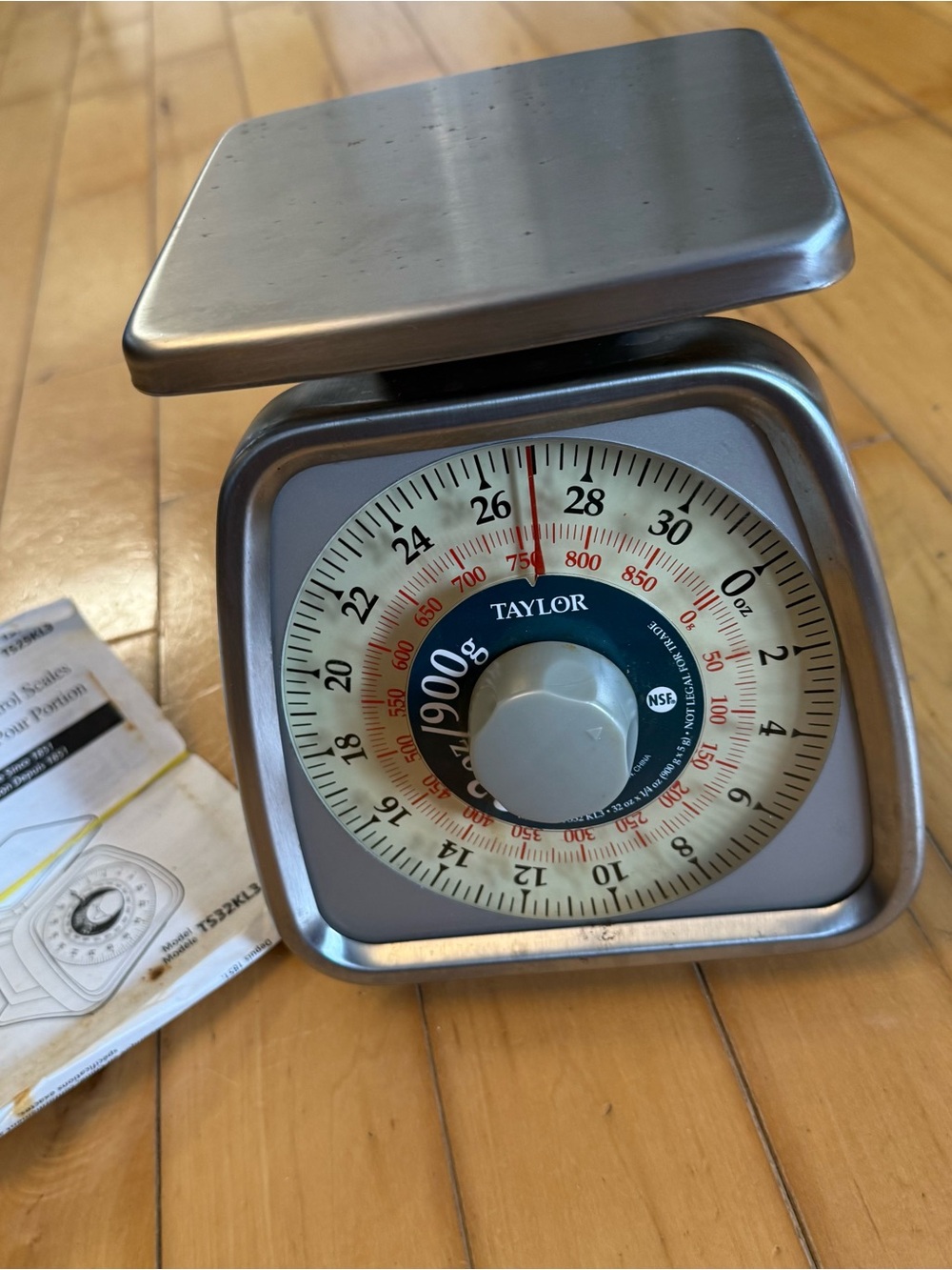 Vintage TAYLOR STAINLESS STEEL branding on metal appliance